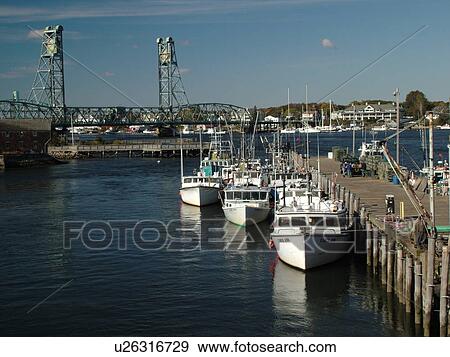 Stock Photo -  Portsmouth, NH, New Hampshire, Portsmouth Harbor, Memorial Bridge, Piscatagua River. Fotosearch