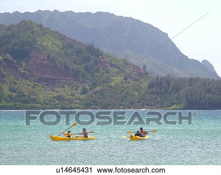 Stock Image -  Princeville, Kauai, HI, Hawaii, North Shore, Hanalei Bay, Black Pot Beach Park, Hanalei Beach Park, kayaking. Fotosearch