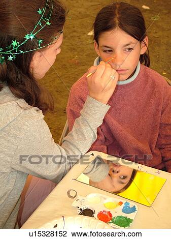 Randolph, VT, Vermont, New World Festival, young girl getting her face painting at the festival View Large Photo Image Stock Image -  Randolph, VT, Vermont, New World Festival, young girl getting her face painting at the festival. Fotosearch