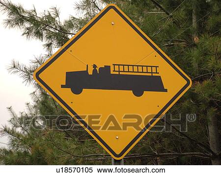 Stock Photography -  road sign, Emergency Vehicles Entering Highway sign, fire station ahead, warning sign. Fotosearch
