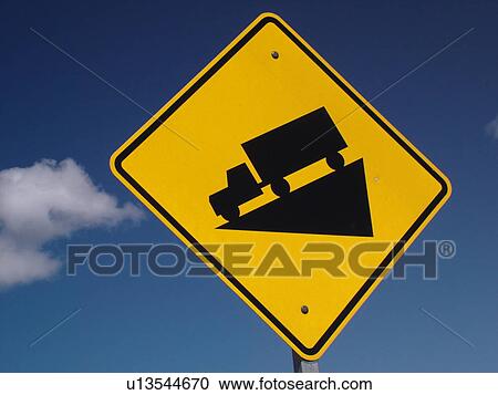 road sign, Hill, Steep Grade Ahead, trucks use low gear sign against a blue sky, warning sign View Large Photo Image Stock Image - road sign, Hill, Steep Grade Ahead, trucks use low gear sign against a blue sky, warning sign. Fotosearch