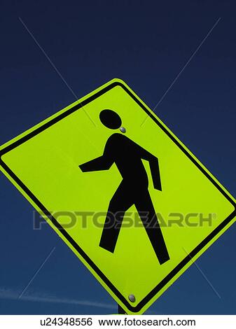 road sign, Pedestrian crossing sign against a blue sky, warning sign, yield to pedestrian View Large Photo Image Stock Photograph - road sign, Pedestrian crossing sign against a blue sky, warning sign, yield to pedestrian. Fotosearch