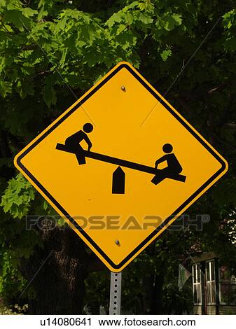 Stock Image -  road sign, Playground Ahead sign, children at play, warning sign. Fotosearch