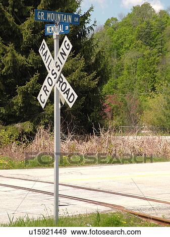 road sign, Railroad Crossing sign, train track, View Large Photo Image Stock Photo - road sign, Railroad Crossing sign, train track, . Fotosearch