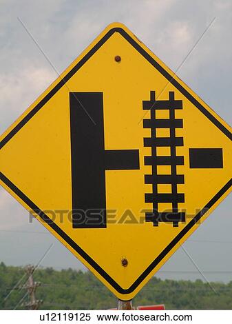 Stock Photography -  road sign, Railroad Crossing sign, approaching railroad crossing, warning sign. Fotosearch