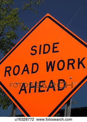 Stock Image -  road sign, Side Road Work Ahead, warning sign, construction. Fotosearch