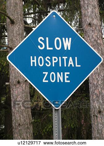 road sign, Slow Hospital Zone View Large Photo Image Stock Photo - road sign, Slow Hospital Zone. Fotosearch