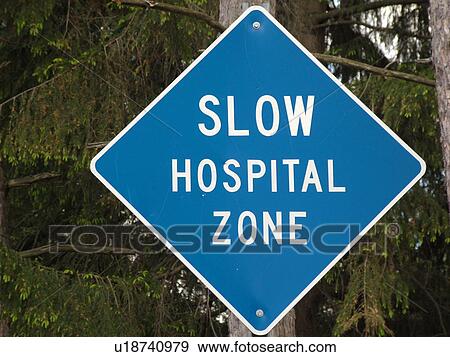 road sign, Slow Hospital Zone View Large Photo Image Stock Photo - road sign, Slow Hospital Zone. Fotosearch