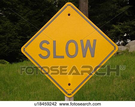 road sign, Slow, warning sign, View Large Photo Image Stock Image - road sign, Slow, warning sign, . Fotosearch