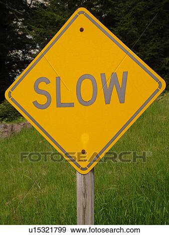 road sign, Slow, warning sign, View Large Photo Image Stock Photo - road sign, Slow, warning sign, . Fotosearch