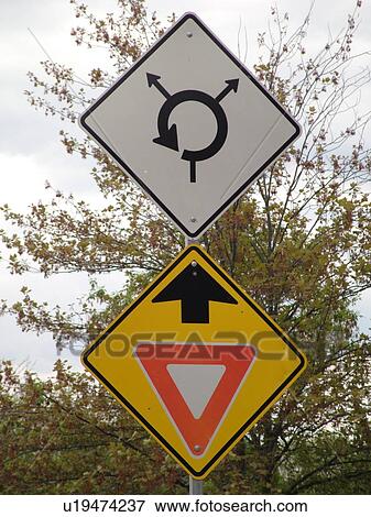 road sign, Yield Ahead sign, Approaching Traffic Circle, approaching roundabout View Large Photo Image Stock Photo - road sign, Yield Ahead sign, Approaching Traffic Circle, approaching roundabout. Fotosearch