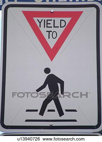road sign, Yield to Pedestrian sign, pedestrian crossing sign, regulatory sign View Large Photo Image Stock Photograph - road sign, Yield to Pedestrian sign, pedestrian crossing sign, regulatory sign. Fotosearch