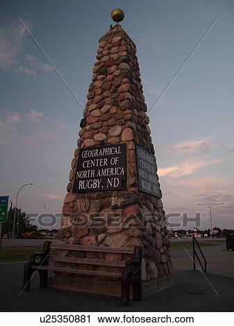 Stock Image -  Rugby, ND, North Dakota, Geographical Center of North America, fieldstone cairn. Fotosearch