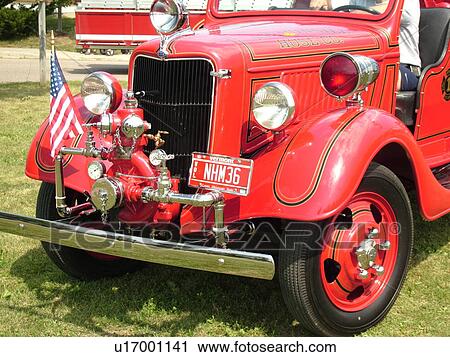 Stock Image -  Shelburne, VT, Vermont, Vermont Teddy Bear Company, Antique Fire Truck display. Fotosearch