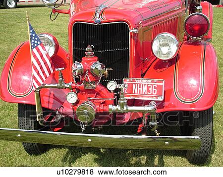 Stock Photo -  Shelburne, VT, Vermont, Vermont Teddy Bear Company, Antique Fire Truck display. Fotosearch