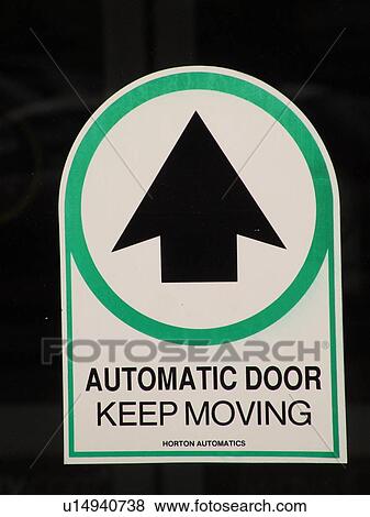 Stock Photo -  sign, Automatic Door, Keep Moving, entrance to store. Fotosearch