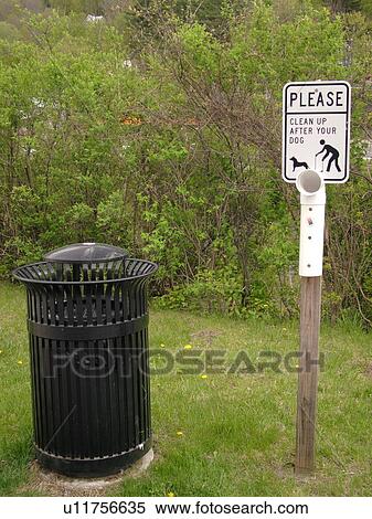 Stock Photography -  sign, Clean up after your dog sign, trash can, . Fotosearch