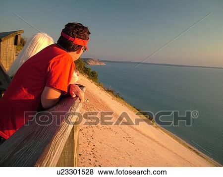 Sleeping Bear Sand Dunes National Lakeshore, MI, Michigan, Lake Michigan, overlook, Pierce Stocking Scenic Drive, dunes, people View Large Photo Image Stock Photo - Sleeping Bear Sand Dunes National Lakeshore, MI, Michigan, Lake Michigan, overlook, Pierce Stocking Scenic Drive, dunes, people. Fotosearch