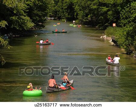 Stock Photo -  Sleeping Bear Sand Dunes National Lakeshore, MI, Michigan, Platte River, canoeists, kayakists. Fotosearch