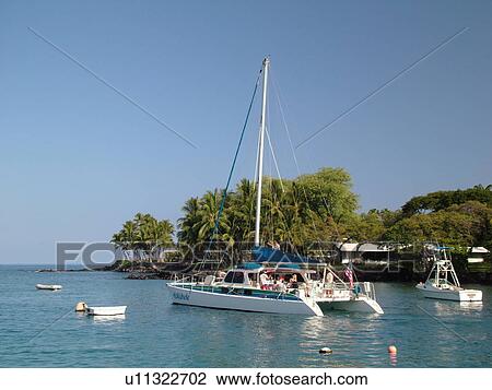 Stock Image -  South Kona, Big Island, Island of Hawaii, HI, Hawaii, Kona Coast, Leeward, West Coast, Keauhou, Keauhou Bay, harbor, charter cruise. Fotosearch