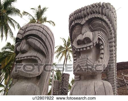 Stock Image -  South Kona, Big Island, Island of Hawaii, HI, Hawaii, Kona Coast, Leeward, West Coast, Captain Cook, Honaunau, Pu'uhonua O Honaunau National Historical Park, Place of Refuge, Kii, carved wooden images of Gods, guardians, . Fotosearch