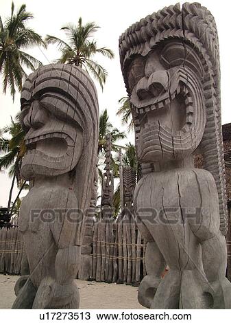 Stock Image -  South Kona, Big Island, Island of Hawaii, HI, Hawaii, Kona Coast, Leeward, West Coast, Captain Cook, Honaunau, Pu'uhonua O Honaunau National Historical Park, Place of Refuge, Kii, carved wooden images of Gods, guardians, . Fotosearch