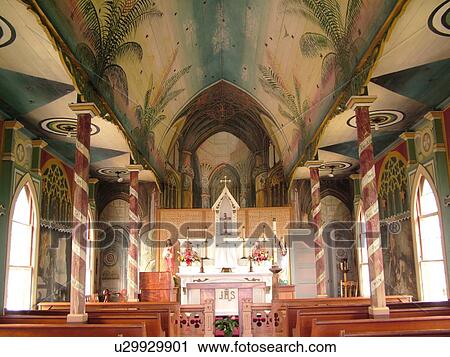 Stock Image -  South Kona, Big Island, Island of Hawaii, HI, Hawaii, Kona Coast, Leeward, West Coast, Captain Cook, Honaunau, St. Benedict's Painted Church, Belgium Father John Berchmans Velghe, A Catholic priest. Fotosearch