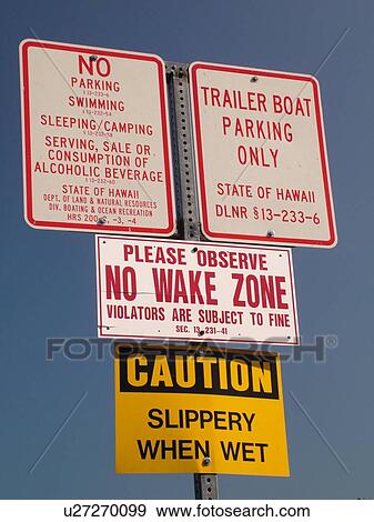 Stock Photo -  South Kona, Big Island, Island of Hawaii, HI, Hawaii, Kona Coast, Leeward, West Coast, Keauhou, Keauhou Bay, warning signs. Fotosearch