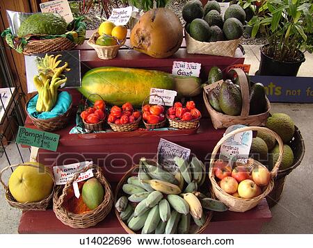 Stock Photograph -  South Kona, Big Island, Island of Hawaii, HI, Hawaii, Kona Coast, Leeward, West Coast, Captain Cook, South Kona Fruit Stand, roadside farm stand, tropical fruit. Fotosearch