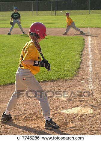 St. Joseph, MN, Minnesota, Boys Little League Baseball Game, position, batter ready for pitch, runner on first base View Large Photo Image Stock Photograph - St. Joseph, MN, Minnesota, Boys Little League Baseball Game, position, batter ready for pitch, runner on first base. Fotosearch
