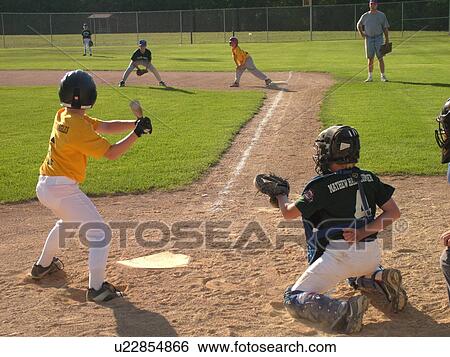 St. Joseph, MN, Minnesota, Boys Little League Baseball Game, position, batter ready for pitch, catcher ready, runner on first base View Large Photo Image Stock Photograph - St. Joseph, MN, Minnesota, Boys Little League Baseball Game, position, batter ready for pitch, catcher ready, runner on first base. Fotosearch