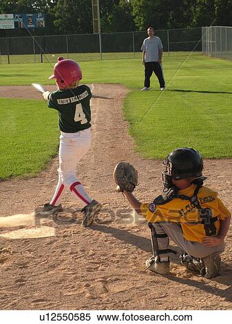St. Joseph, MN, Minnesota, Boys Little League Baseball Game, batter swinging the bat View Large Photo Image Stock Photography - St. Joseph, MN, Minnesota, Boys Little League Baseball Game, batter swinging the bat. Fotosearch