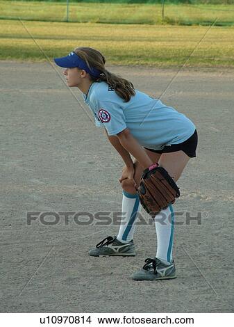 Picture -  St. Joseph, MN, Minnesota, Girls Babe Ruth Softball Game, Little League, Baseball, first baseman, position. Fotosearch