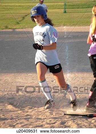 St. Joseph, MN, Minnesota, Girls Babe Ruth Softball Game, Little League, Baseball, girl runs to home plate View Large Photo Image Stock Image - St. Joseph, MN, Minnesota, Girls Babe Ruth Softball Game, Little League, Baseball, girl runs to home plate. Fotosearch