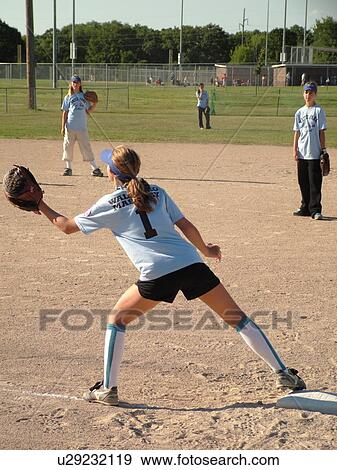 St. Joseph, MN, Minnesota, Girls Babe Ruth Softball Game, Little League, Baseball, first baseman, position, girl with foot on first base ready to catch the ball. View Large Photo Image Stock Photo - St. Joseph, MN, Minnesota, Girls Babe Ruth Softball Game, Little League, Baseball, first baseman, position, girl with foot on first base ready to catch the ball.. Fotosearch