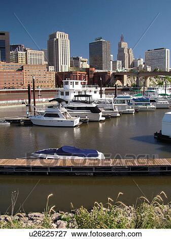 Stock Photo -  St. Paul, MN, Minnesota, Twin Cities, Downtown, skyline, Mississippi River, Harriet Island Park. Fotosearch