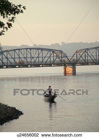 Stock Image -  Stillwater, MN, Minnesota, WI, Wisconsin, St. Croix River, Paddle Wheeler, riverboat, steel bridge, gondola. Fotosearch
