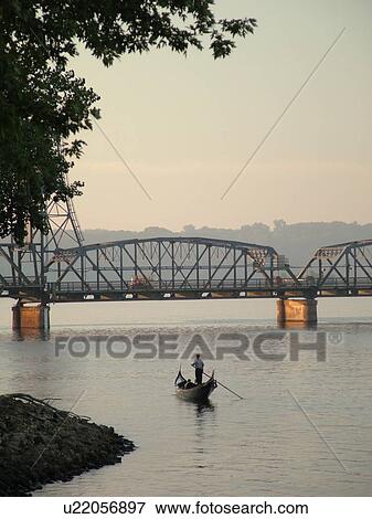 Stock Photo -  Stillwater, MN, Minnesota, WI, Wisconsin, St. Croix River, Paddle Wheeler, riverboat, steel bridge, gondola. Fotosearch