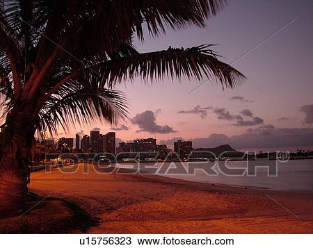 Stock Image -  Waikiki, Honolulu, Oahu, HI, Hawaii, Ala Moana Beach Park, beachfront, morning. Fotosearch