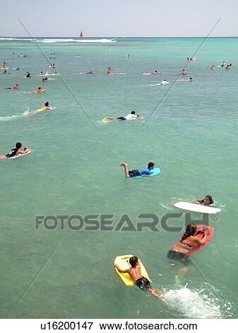 Waikiki, Honolulu, Oahu, HI, Hawaii, Queen's Surf Beach, boogie boarding View Large Photo Image Stock Photo - Waikiki, Honolulu, Oahu, HI, Hawaii, Queen's Surf Beach, boogie boarding. Fotosearch