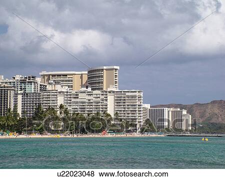Stock Photo -  Waikiki, Honolulu, Oahu, HI, Hawaii, beachfront, skyline. Fotosearch
