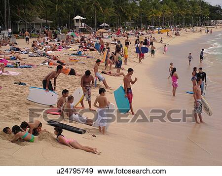 Stock Photo -  Waikiki, Honolulu, Oahu, HI, Hawaii, Queen's Surf Beach . Fotosearch