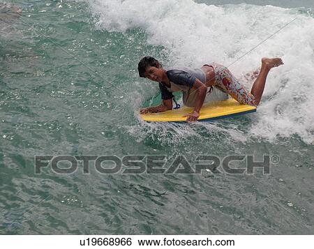 Waikiki, Honolulu, Oahu, HI, Hawaii, Queen's Surf Beach, boogie boarding View Large Photo Image Stock Photograph - Waikiki, Honolulu, Oahu, HI, Hawaii, Queen's Surf Beach, boogie boarding. Fotosearch