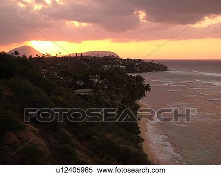Stock Photography -  Waikiki, Honolulu, Oahu, HI, Hawaii, Diamond Head Beach Park, sunrise, scenic coast. Fotosearch