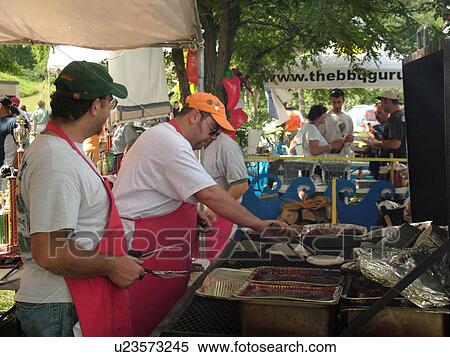 Stock Photography -  Windsor, VT, Vermont, Harpoon Championships of New England Barbecue, Harpoon Brewery, men barbecuing. Fotosearch