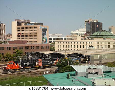 Picture -  Winnipeg, Canada, MB, Manitoba, Downtown, skyline, Winnipeg Railway Museum, Union Station, Via Rail Canada, CN freight train. Fotosearch