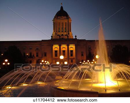 Stock Image -  Winnipeg, Canada, MB, Manitoba, Manitoba Legislative Building, evening, fountain. Fotosearch