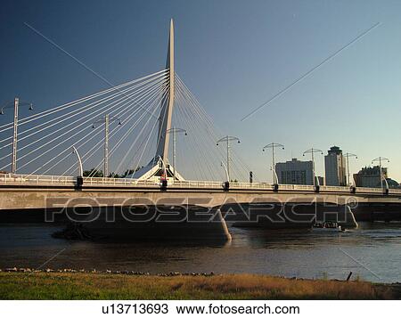 Stock Image -  Winnipeg, Canada, MB, Manitoba, Provencher Bridge & Esplanade Riel Pedestrian Bridge. Fotosearch