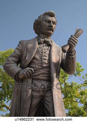 Stock Image -  Winnipeg, Canada, MB, Manitoba, Manitoba Legislative Building Grounds, The Louis Riel Statue facing the Assiniboine River. Fotosearch