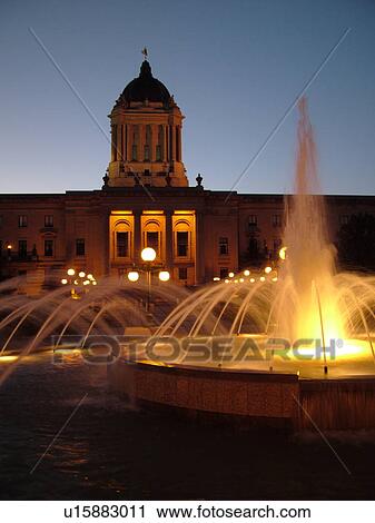 Stock Image -  Winnipeg, Canada, MB, Manitoba, Manitoba Legislative Building, evening, fountain. Fotosearch